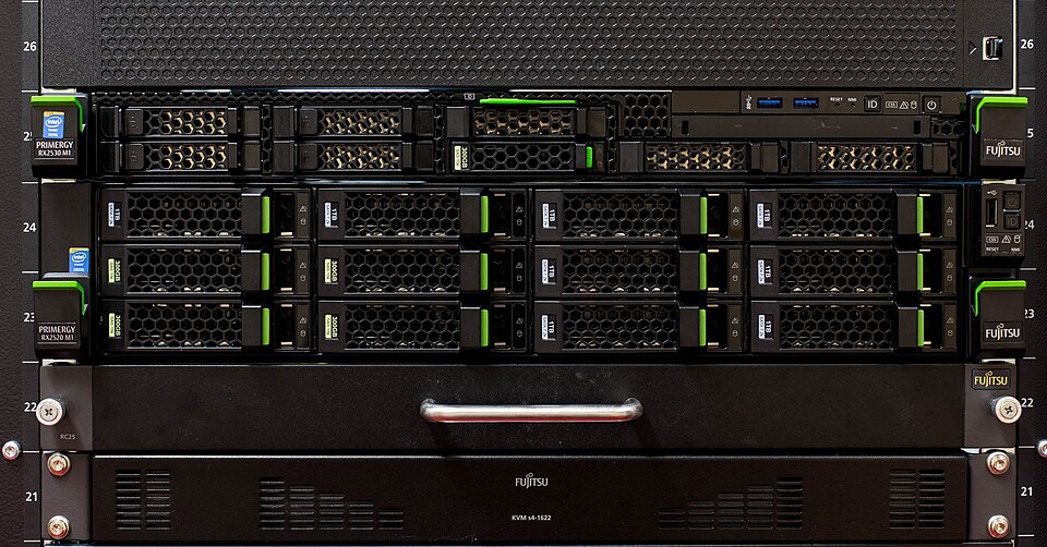 Rows of 1U rack-mounted servers in a server room